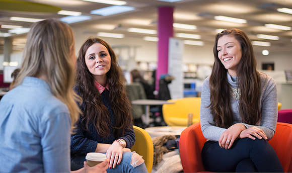 Group of students smiling and talking together, 33Ƶ campus, Edinburgh