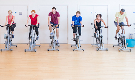 A busy spin class in session in the 33Ƶ sports centre